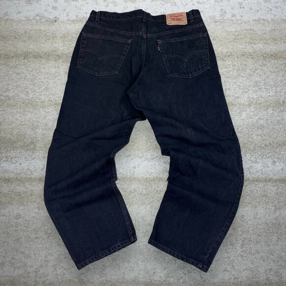 Vintage Levis Jeans 550 Relaxed Fit Jet Black Wash Denim Made in USA 90s